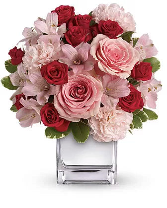 Pretty Pink and Red Roses in a Vase